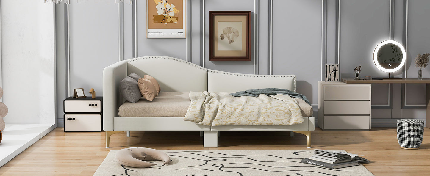 Elegant cream velvet chaise lounge with gold legs and tufted headboard