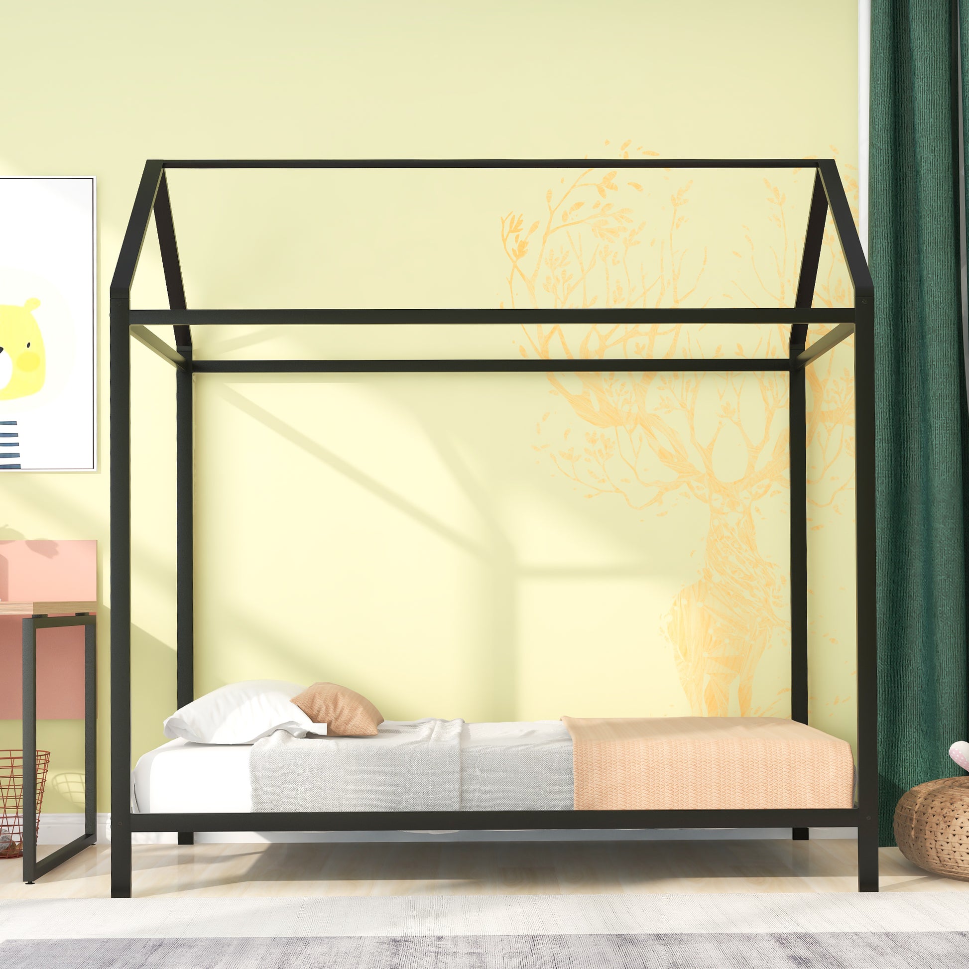Black metal house bed frame with white and peach bedding