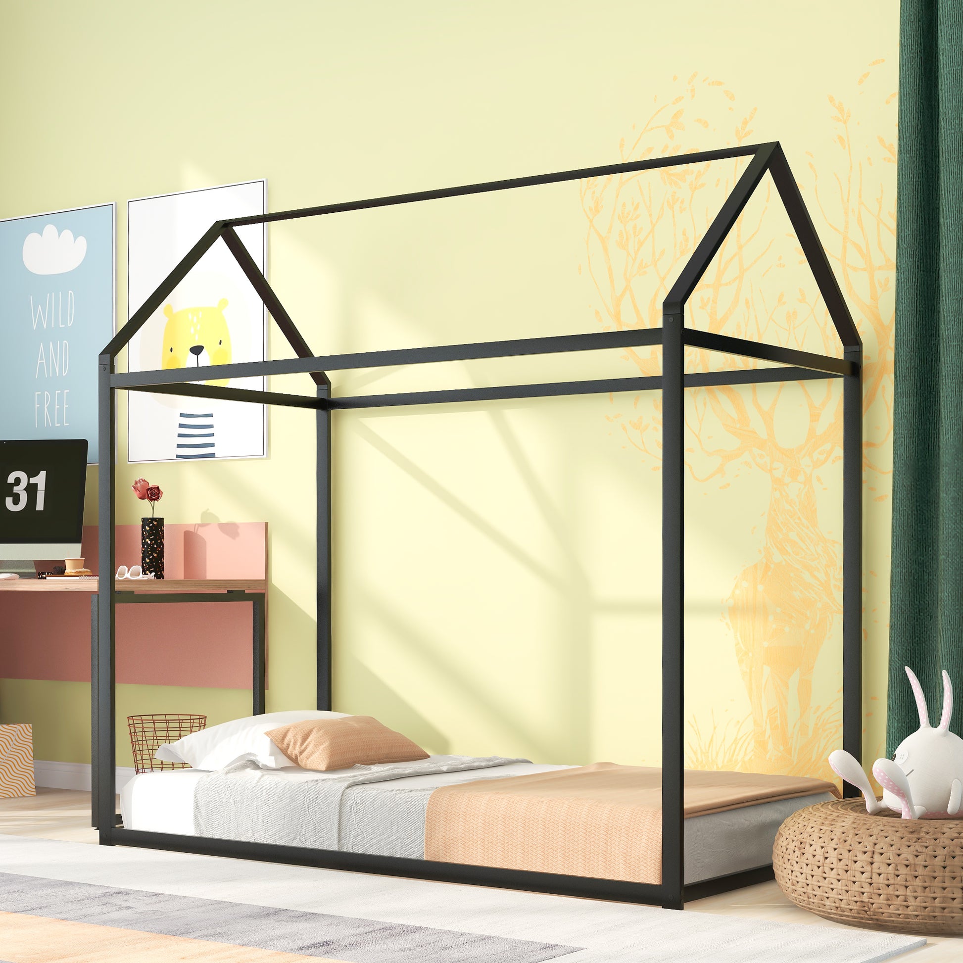 Black metal house bed frame with white and peach bedding