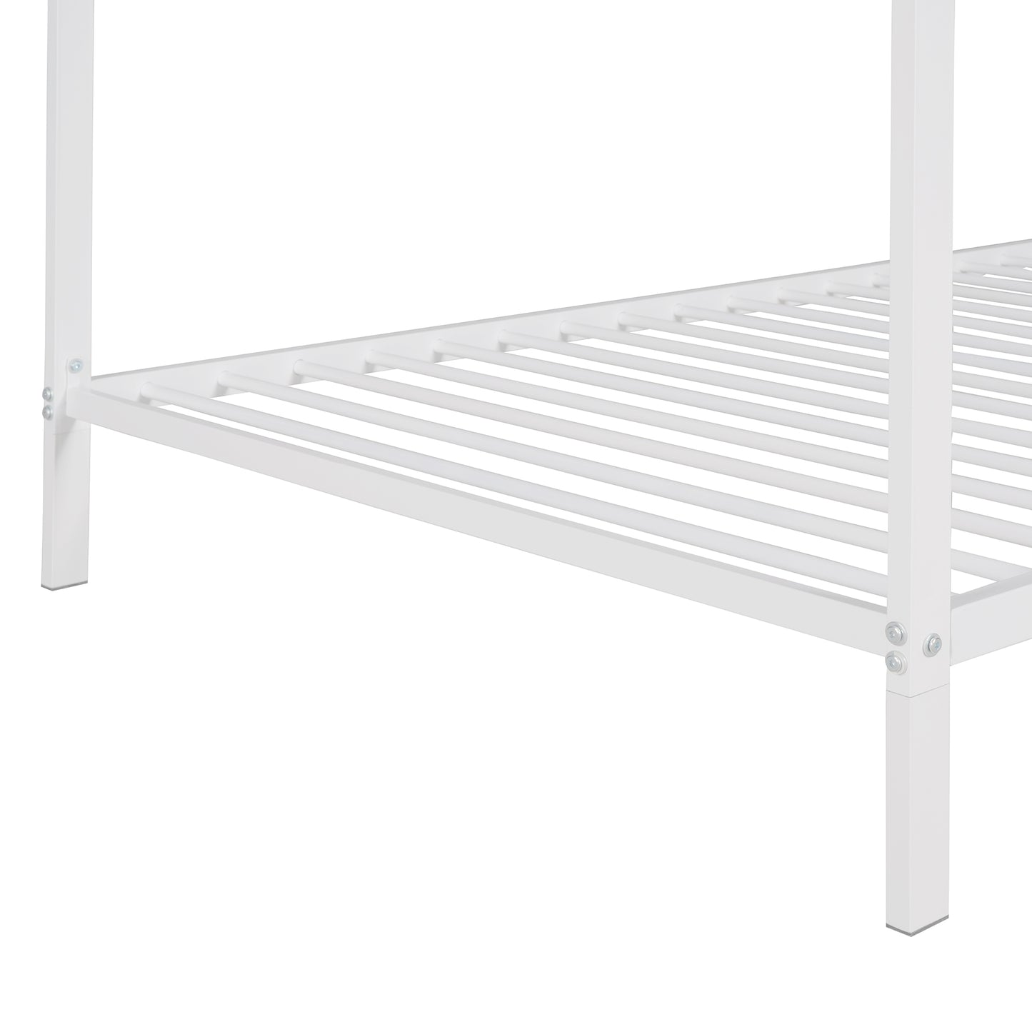 Closeup of a white metal bed frame with slats