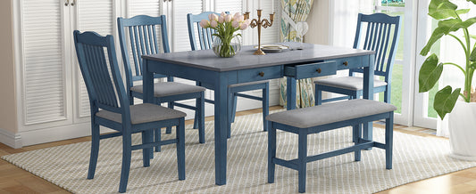 Blue dining table and chairs set with gray upholstered seats