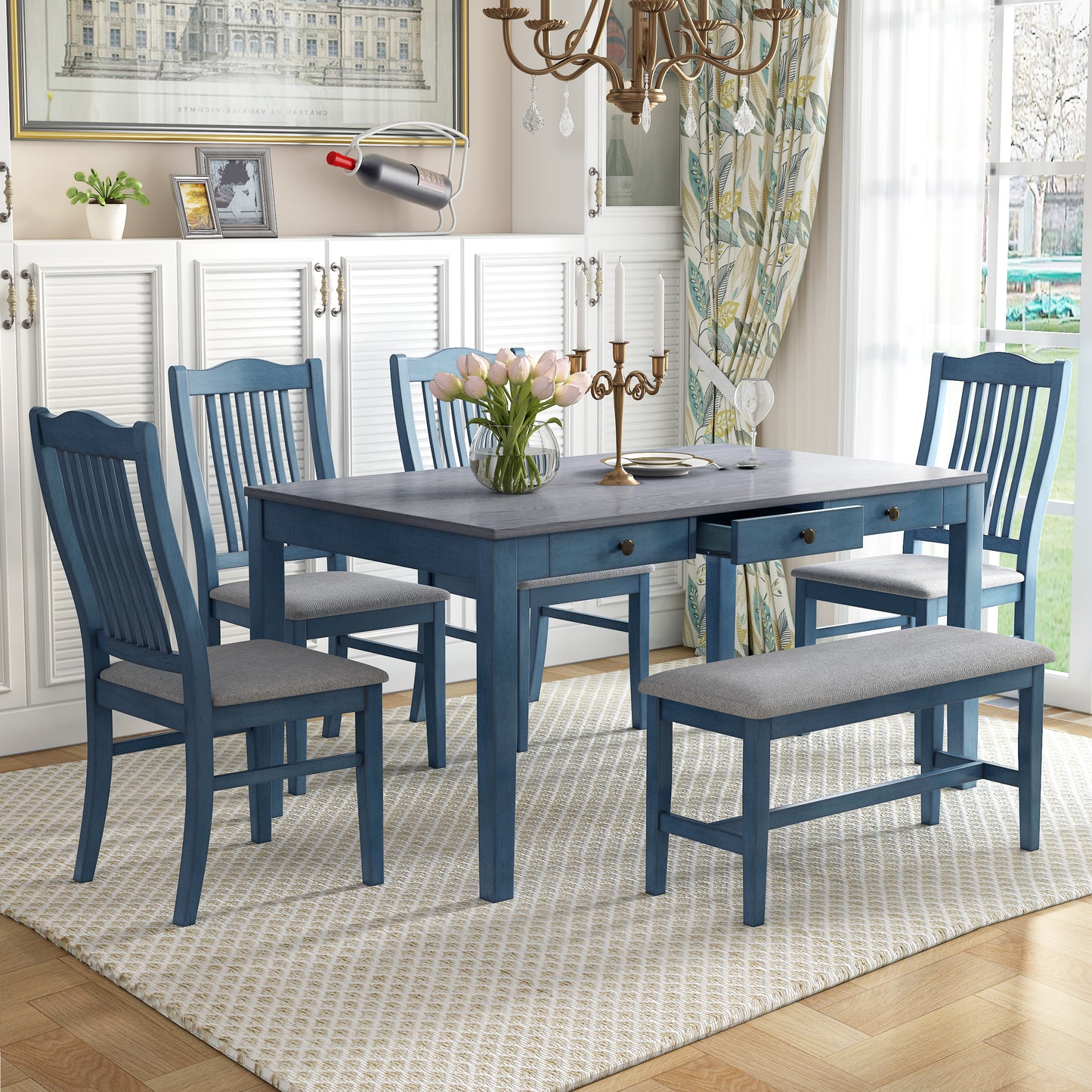 Blue dining table with four chairs and a bench