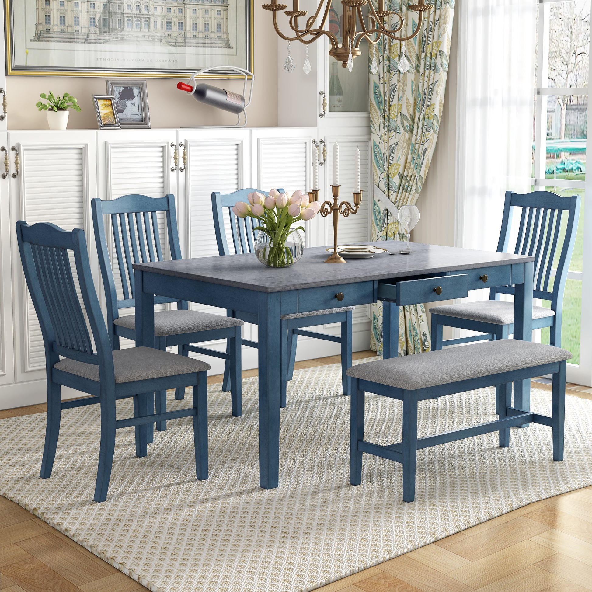 Blue dining table with four chairs and a bench