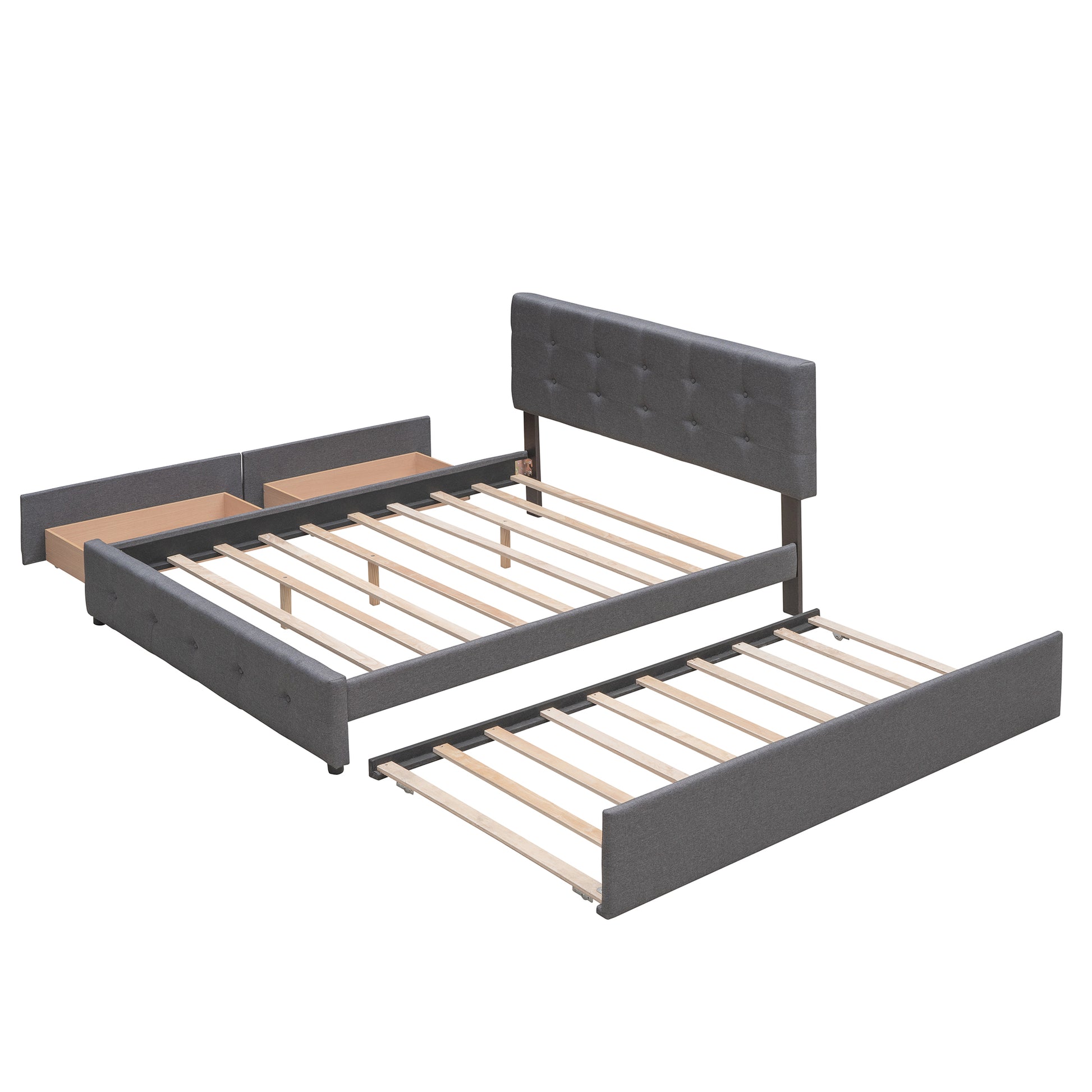 Gray fabric trundle bed with tufted headboard and open drawers