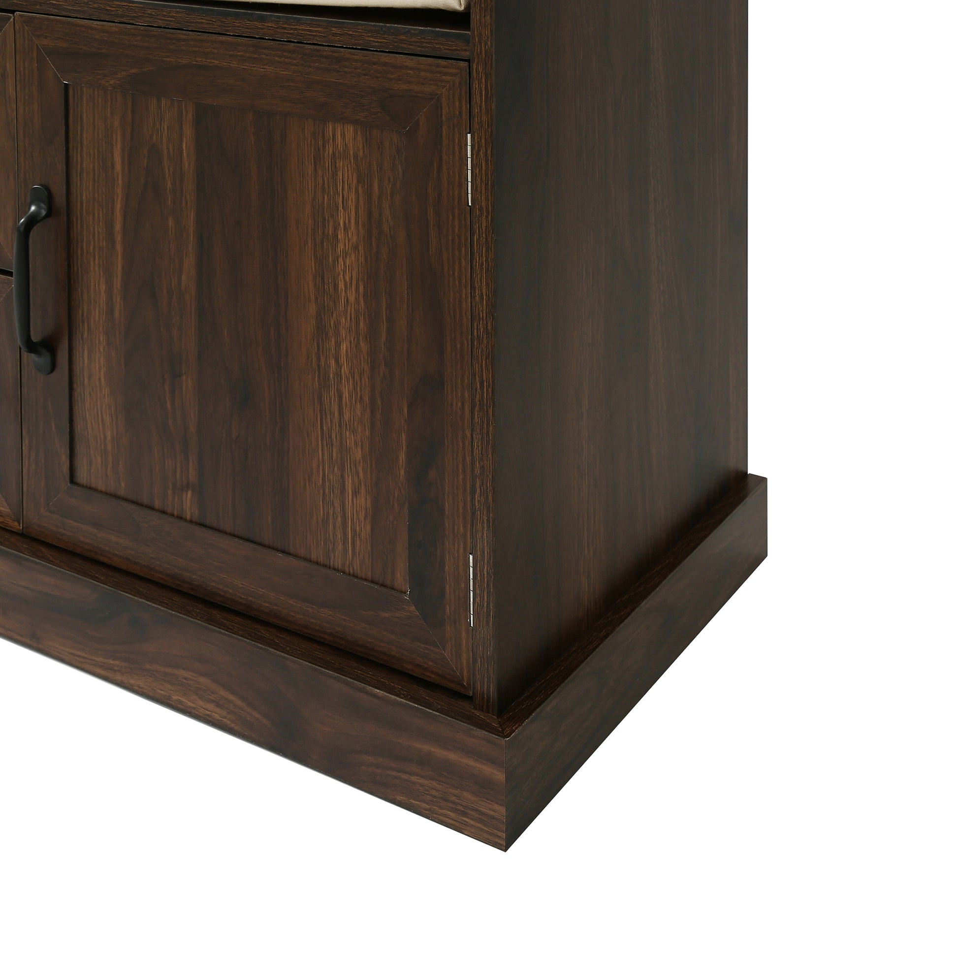 Dark wood cabinet door with black metal handle