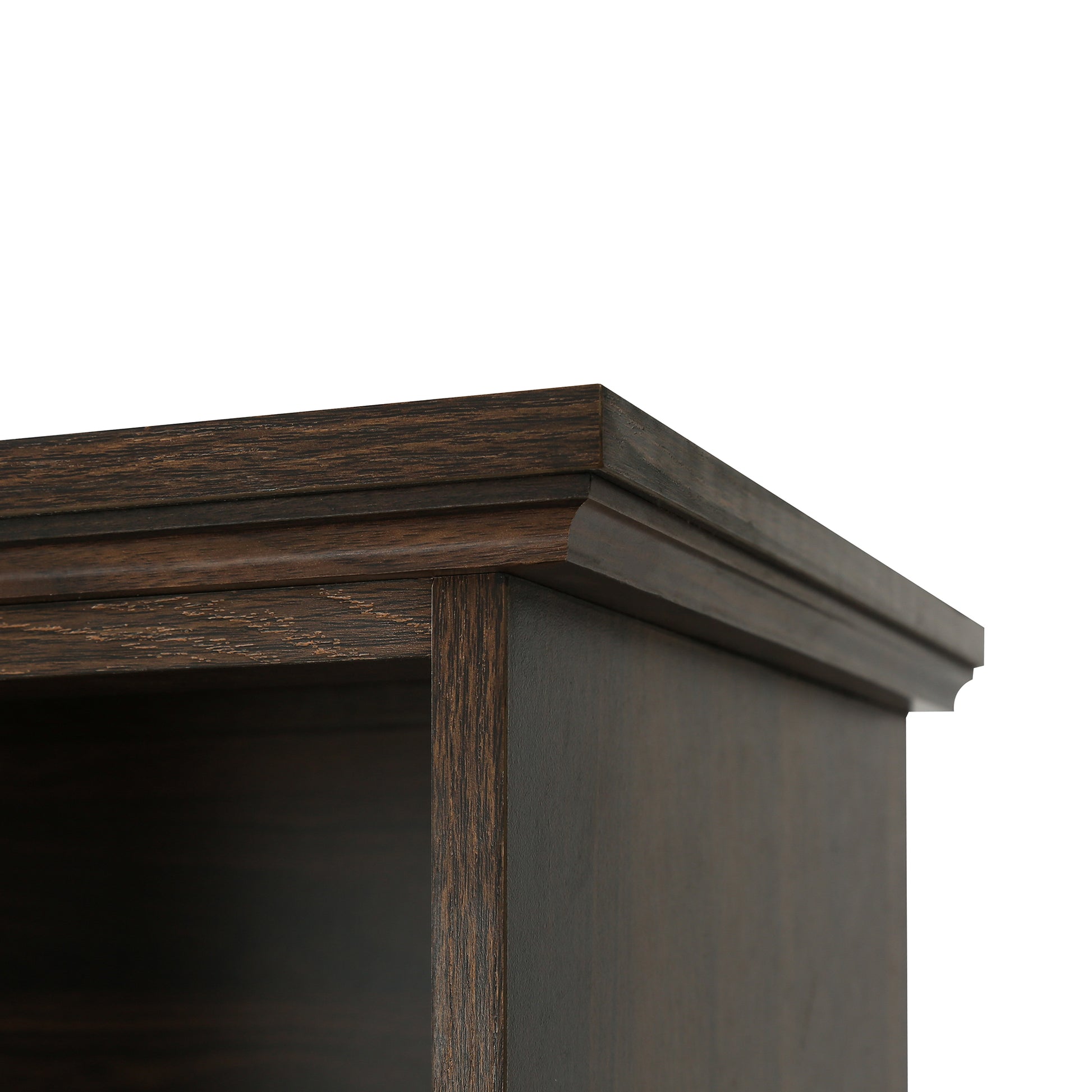 Dark brown wood bookshelf corner with ornate molding detail