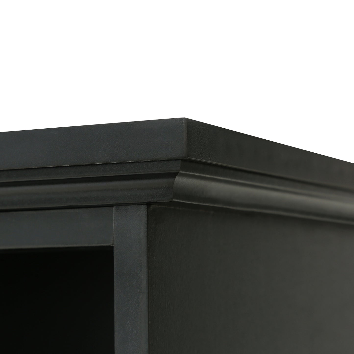 Closeup of black furniture molding detail with a matte finish