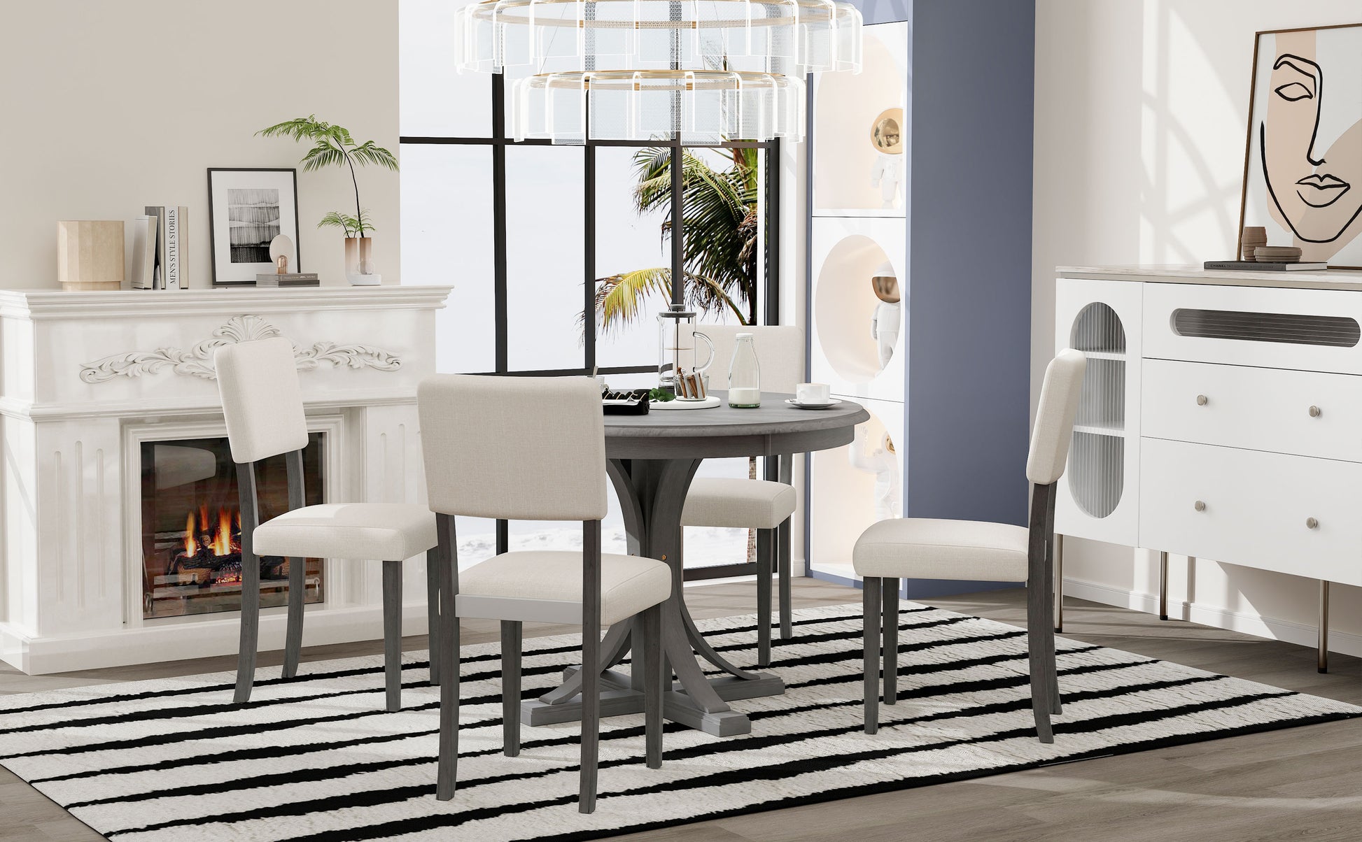 Gray wood pedestal dining table with four upholstered chairs