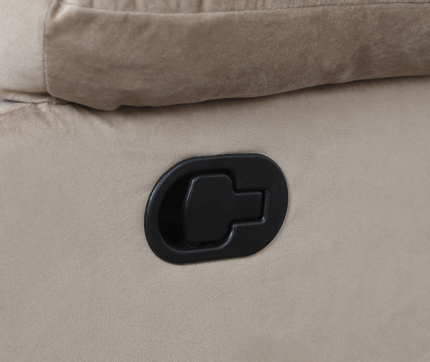 Closeup of beige fabric sofa with black recliner handle