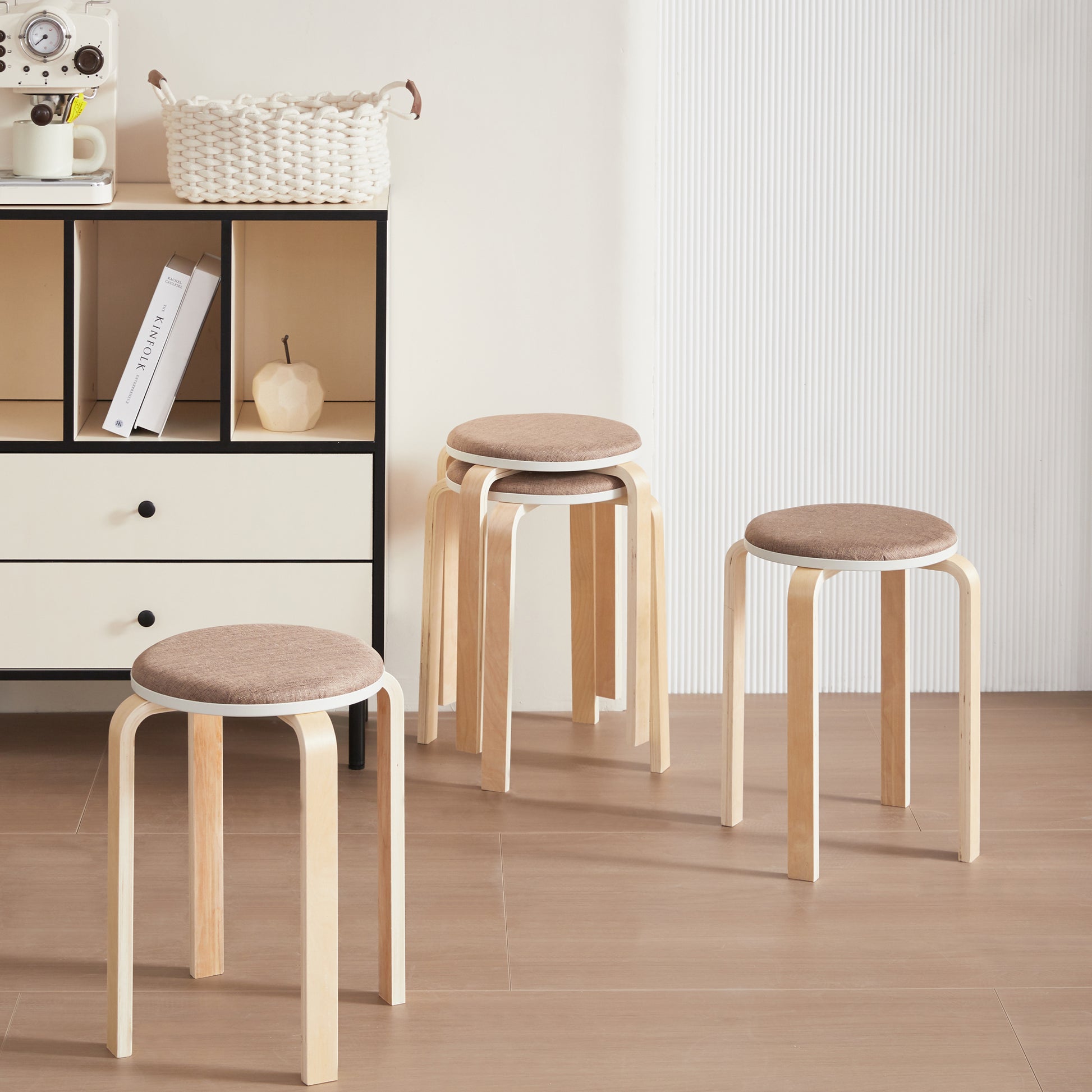 stacking stool with padded brown seat and bentwood frame