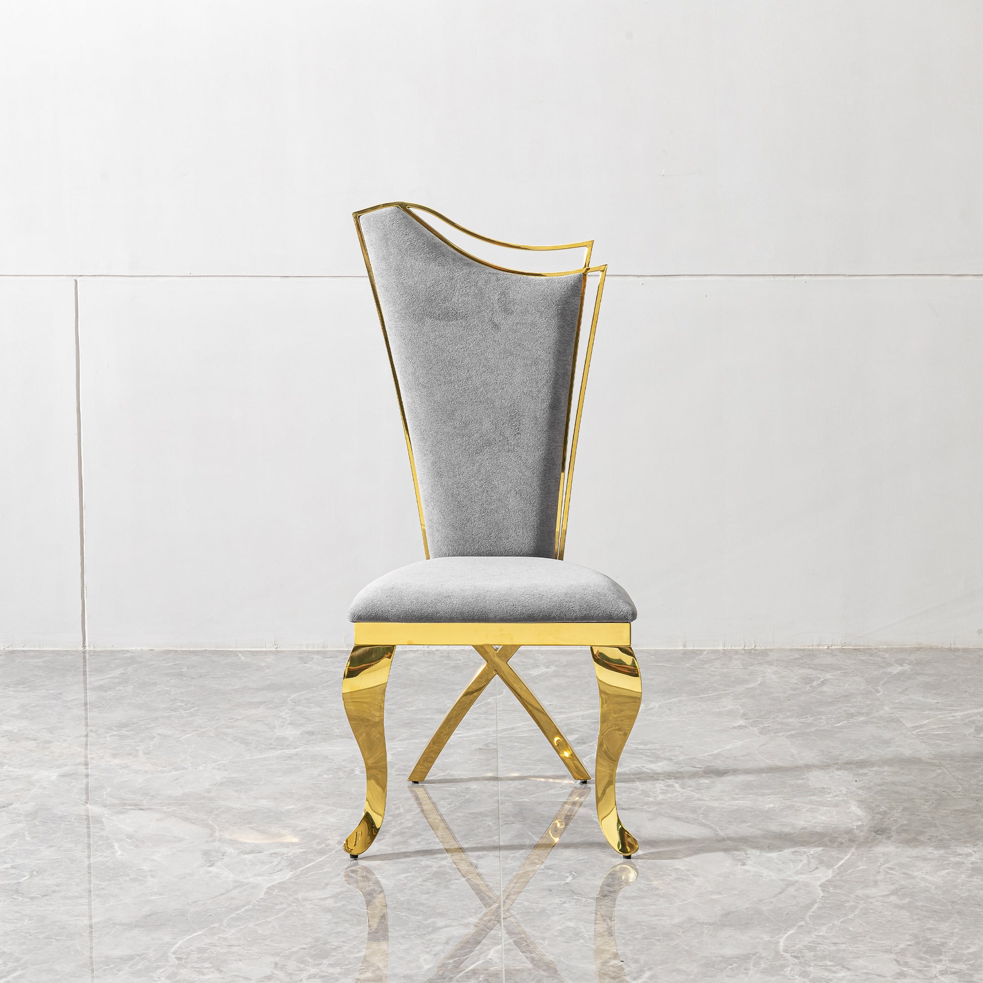 Elegant gray velvet dining chair with polished gold metal frame