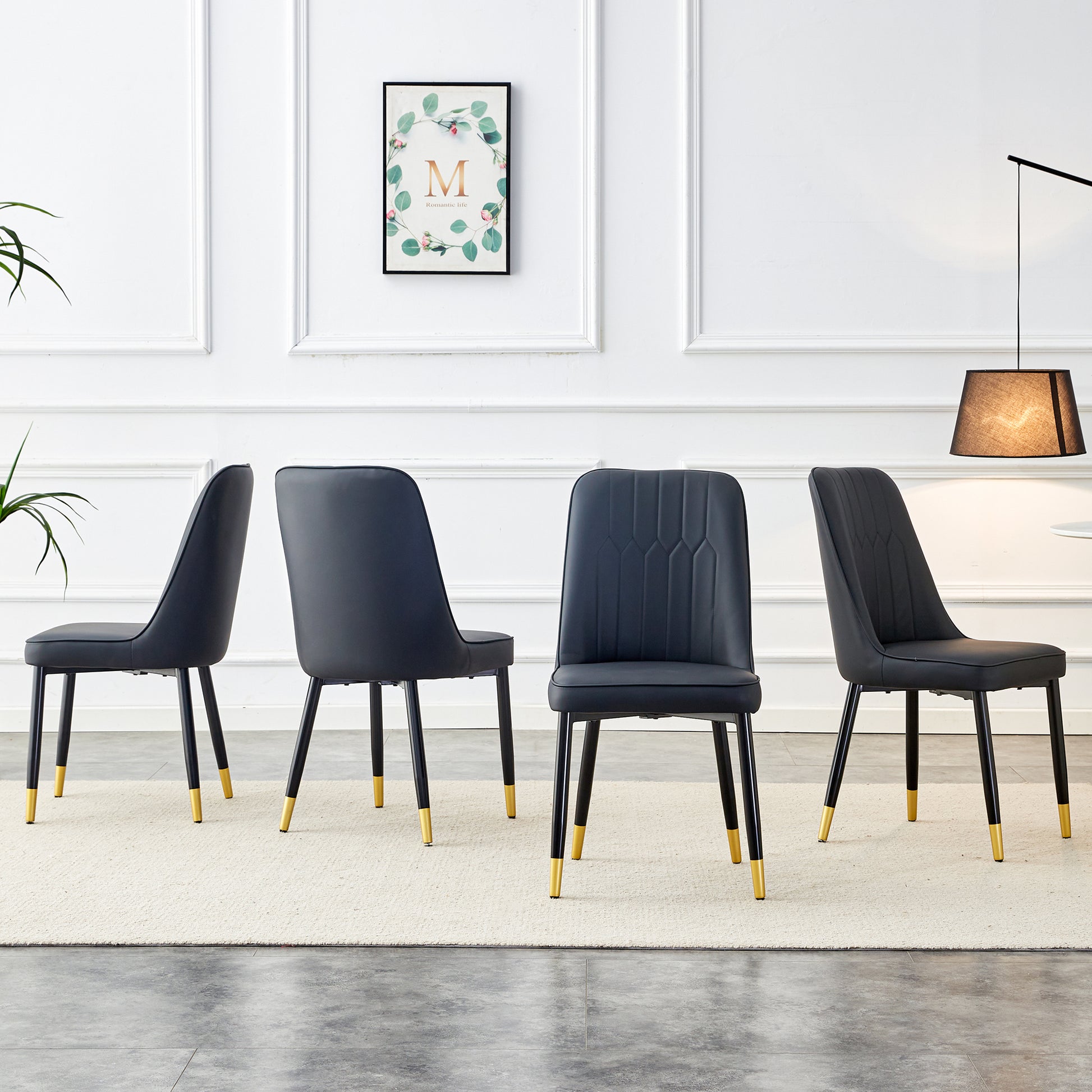 Set of  black dining chairs with gold accents