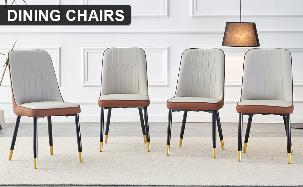Four modern dining chairs with cream upholstered seats and backs brown trim black legs and gold accents