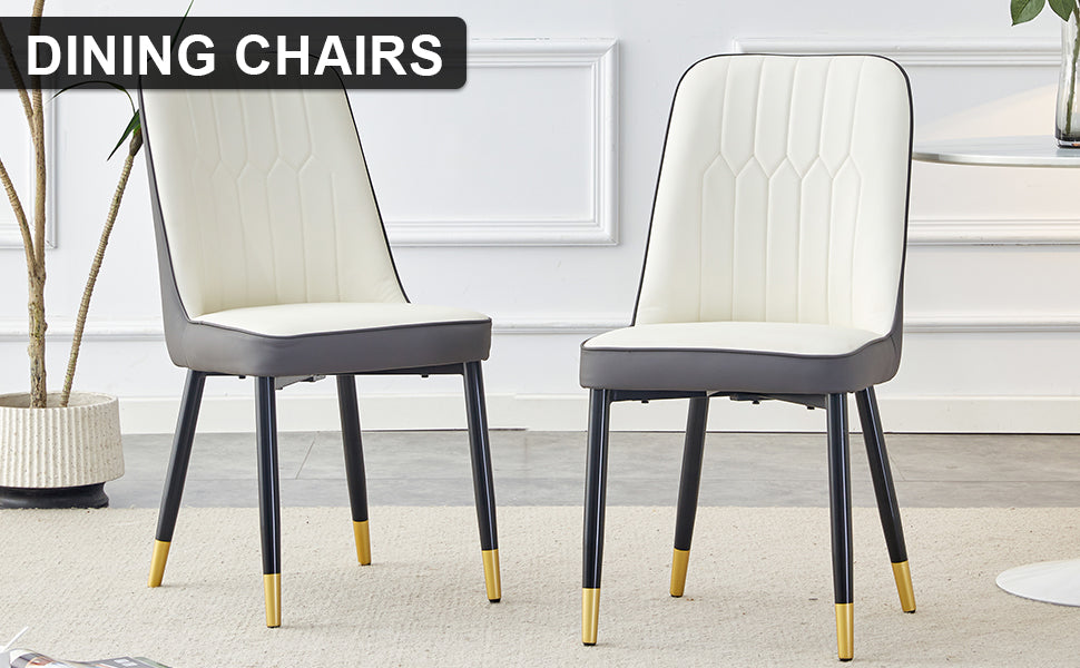 Cream upholstered dining chair with dark grey accents and goldtipped black legs