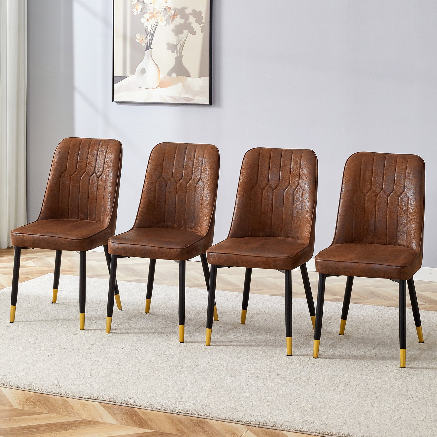 Brown upholstered dining chairs with quilted stitching and black metal legs