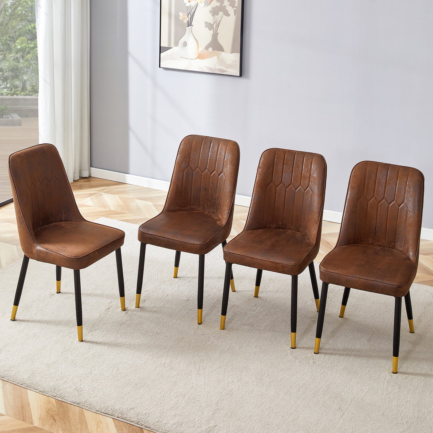 Set of four brown faux leather dining chairs with diamond stitching and black legs