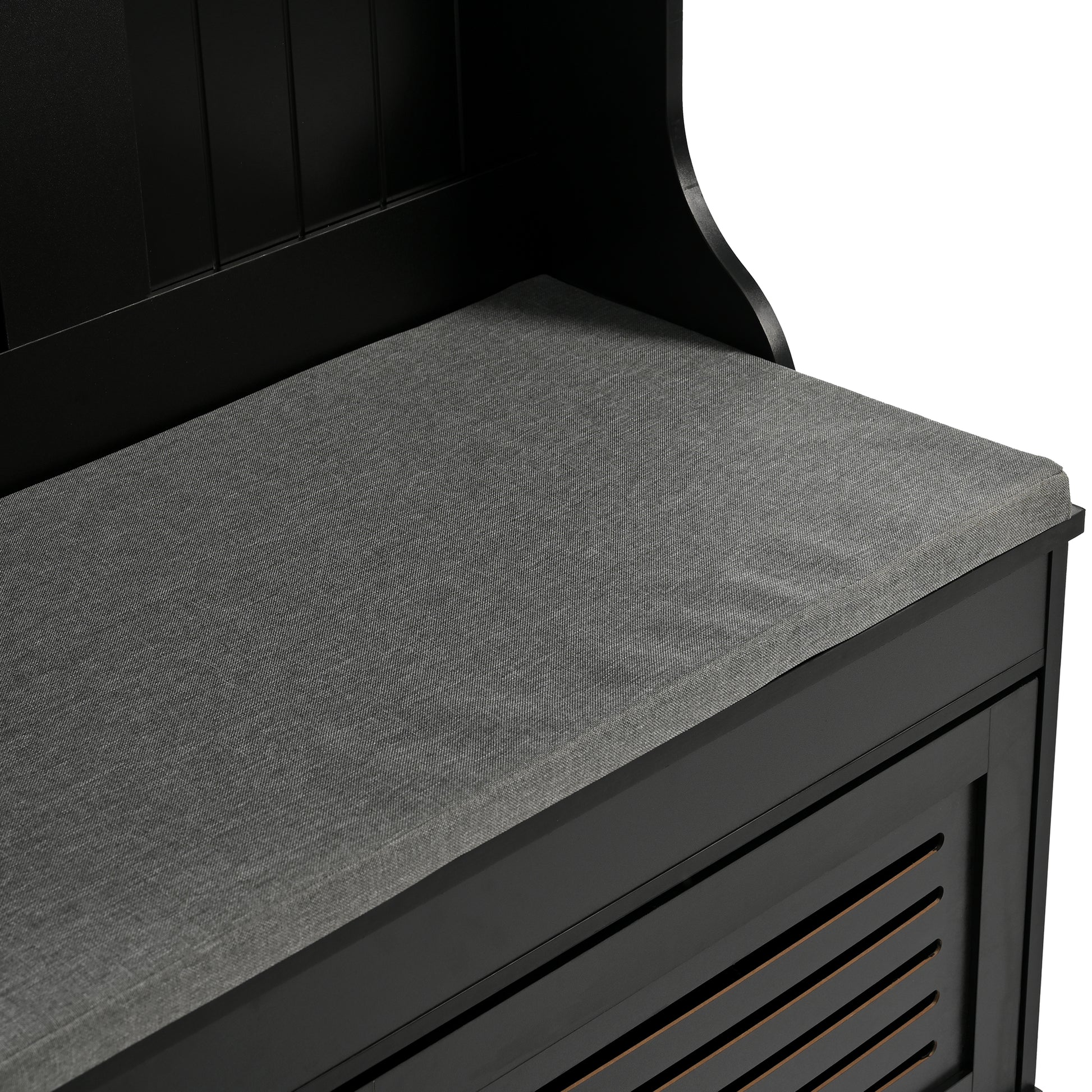 Black entryway bench with grey upholstered seat and slatted doors