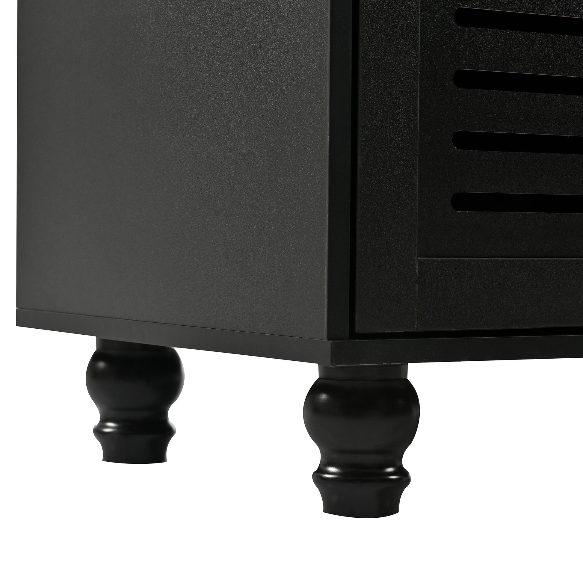 Black wooden cabinet with decorative turned legs and slatted door detail