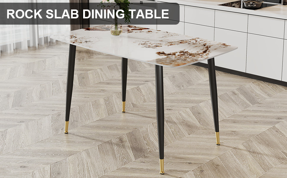 Rectangular rock slab dining table with marbled brown and white top and black tapered legs with gold caps