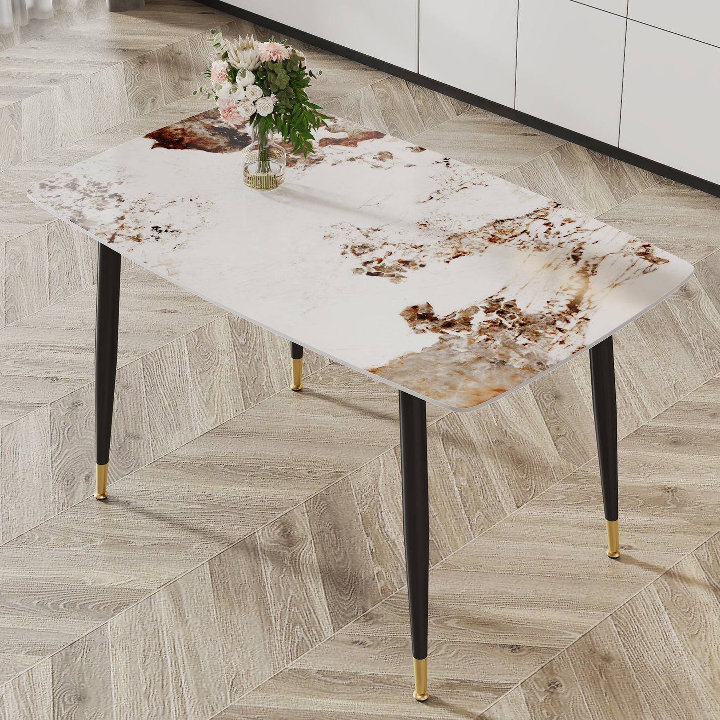 Rectangular dining table with white and brown marblepatterned top and black legs with gold accents