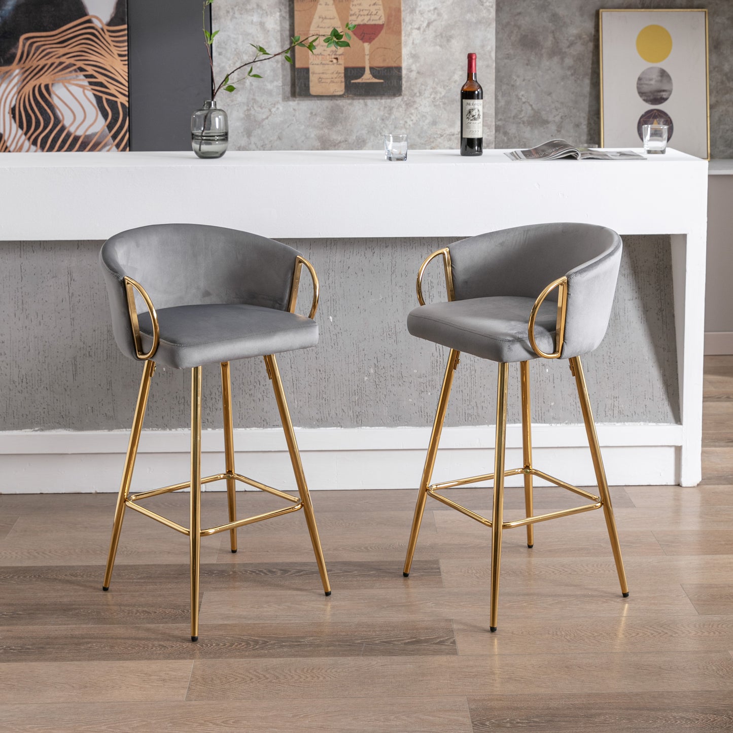 Grey velvet bar stool with gold legs and arms