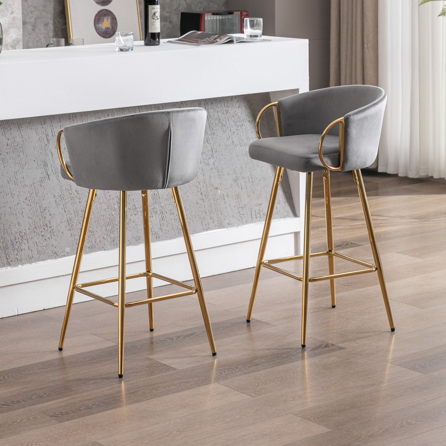 Grey velvet bar stool with gold metal legs