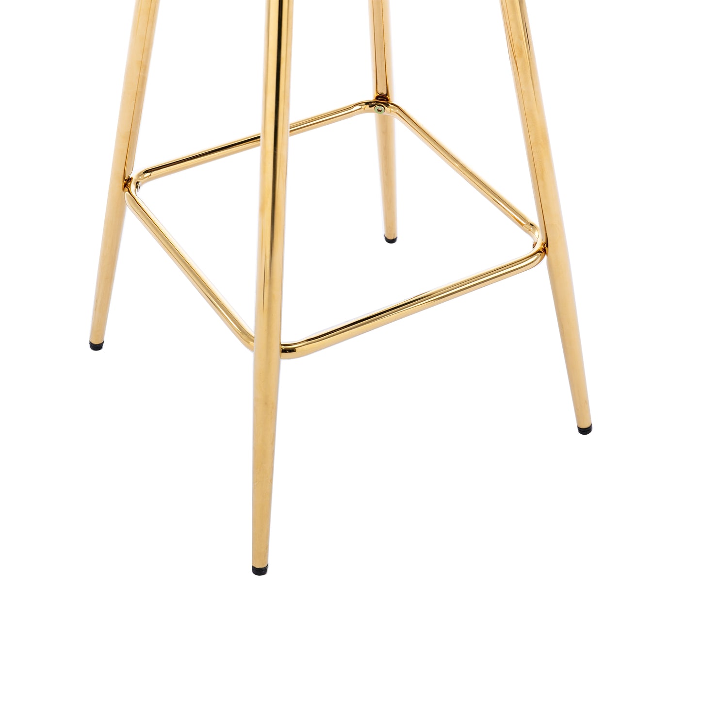 Closeup of polished gold metal bar stool legs with a square footrest