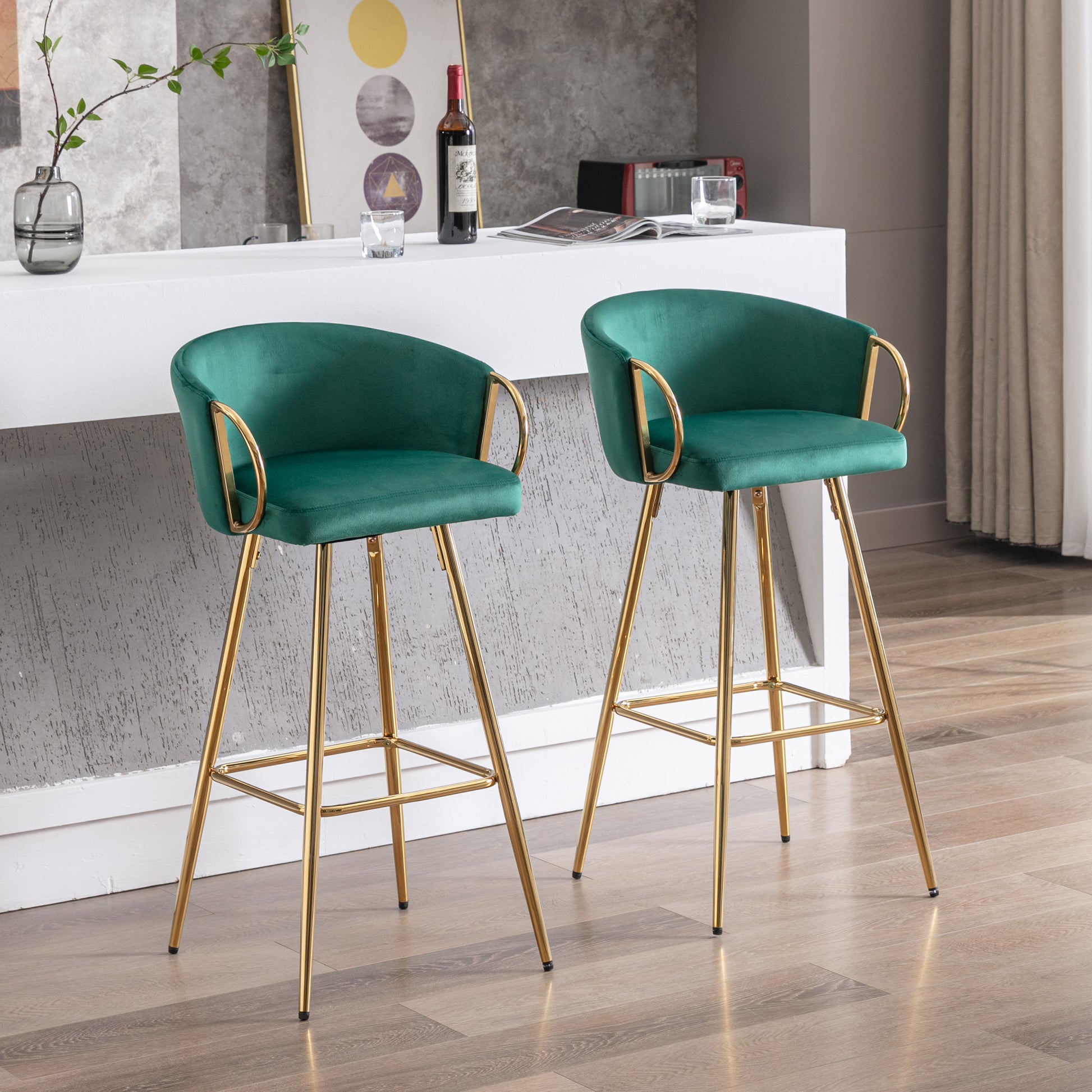 Emerald green velvet bar stools with gold legs