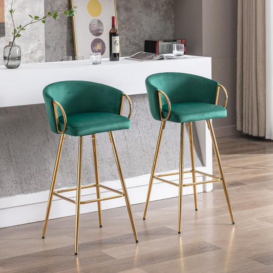 Emerald green velvet bar stools with gold legs