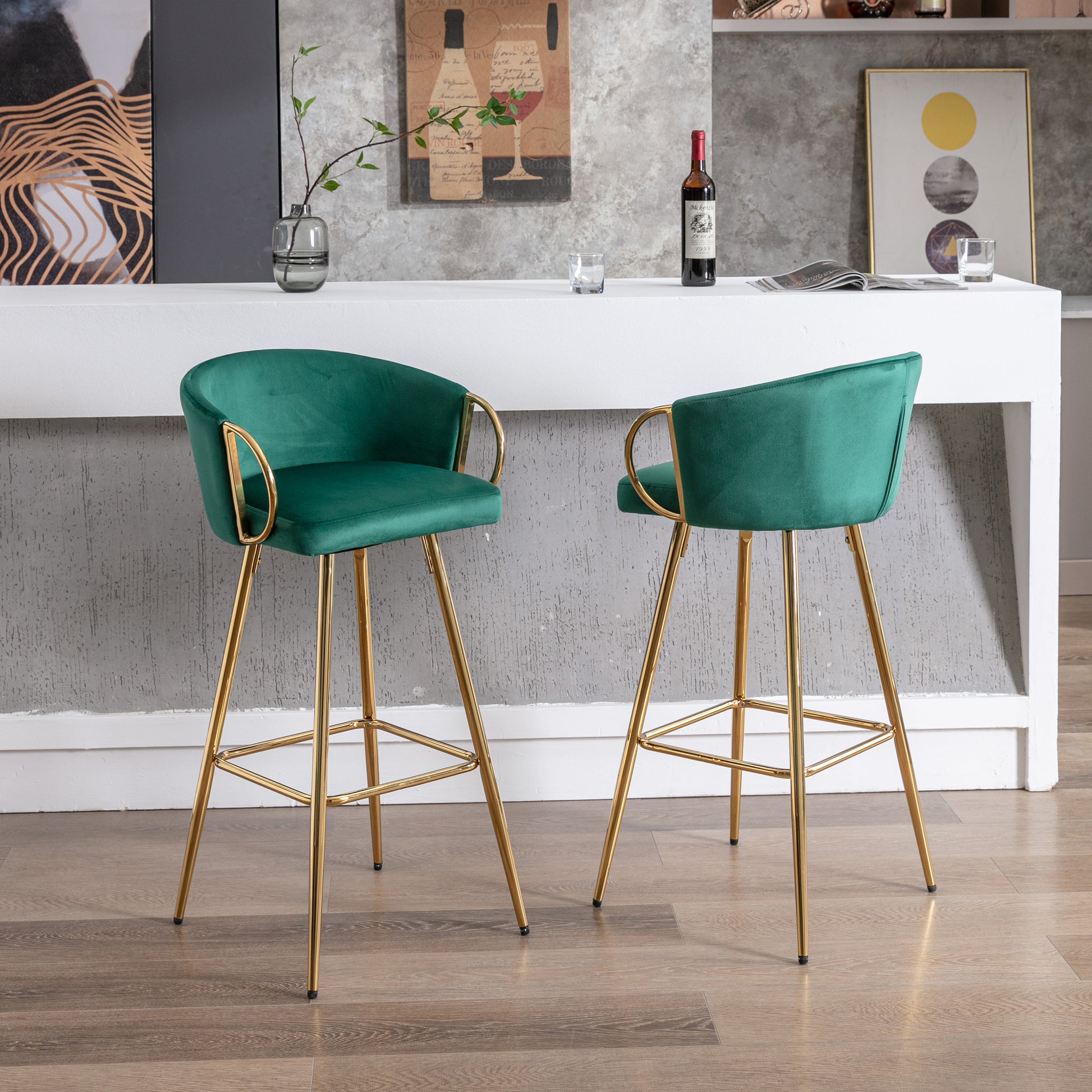 Emerald green velvet bar stool with gold legs and armrests