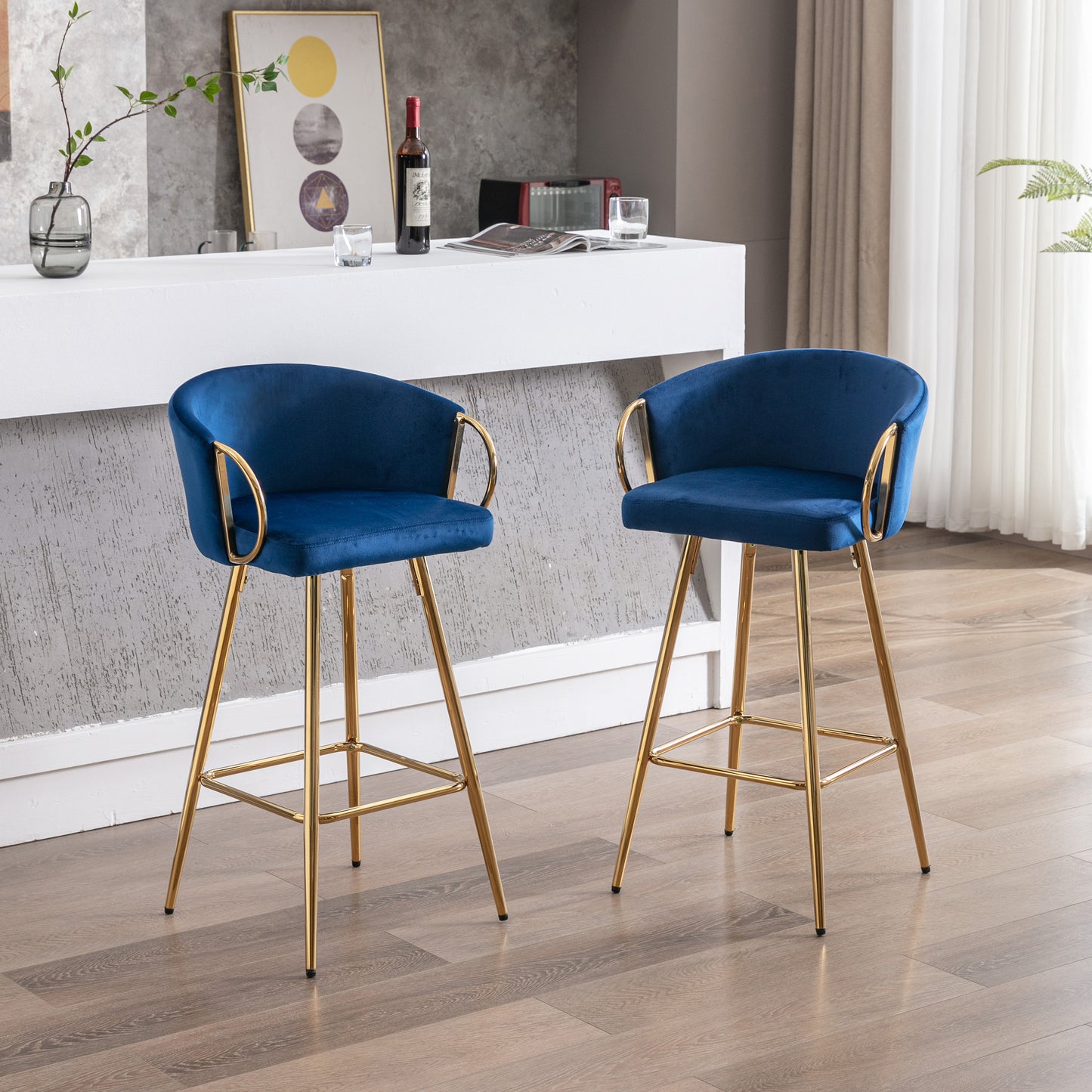 Luxurious navy blue velvet bar stool with gold metal legs and armrests