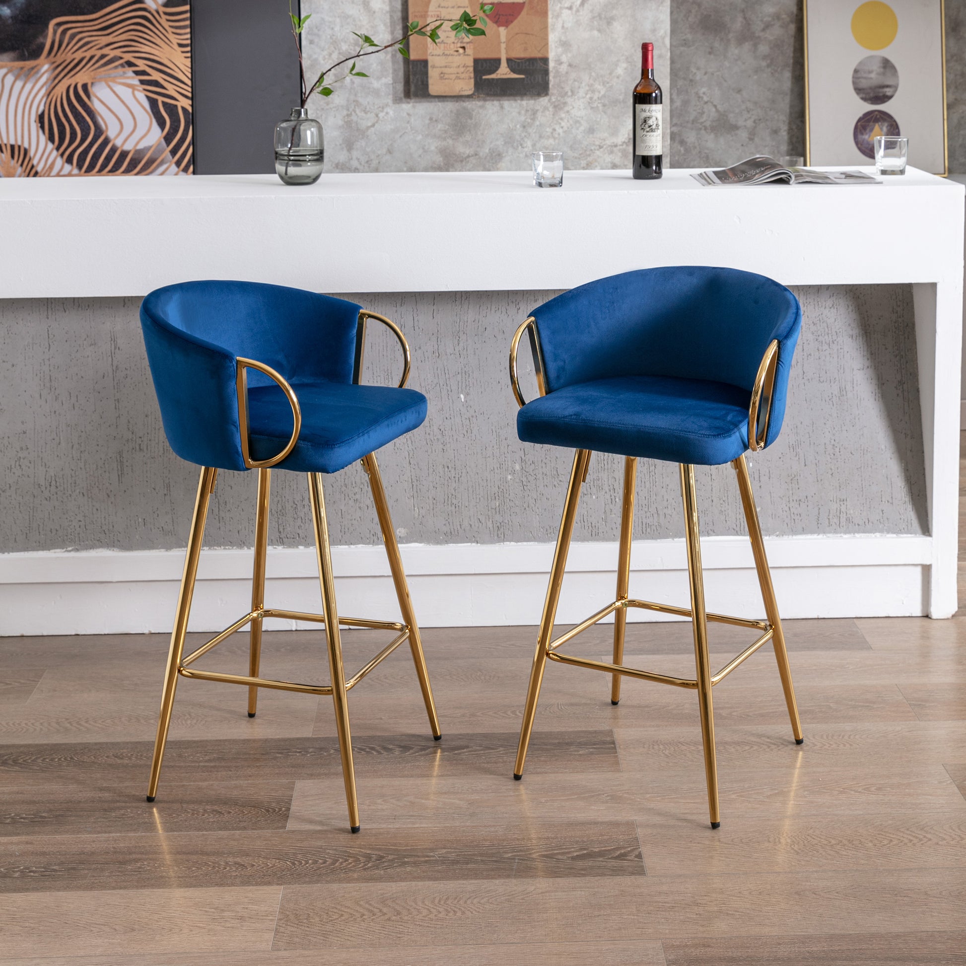 Elegant blue velvet bar stool with gold legs and arms