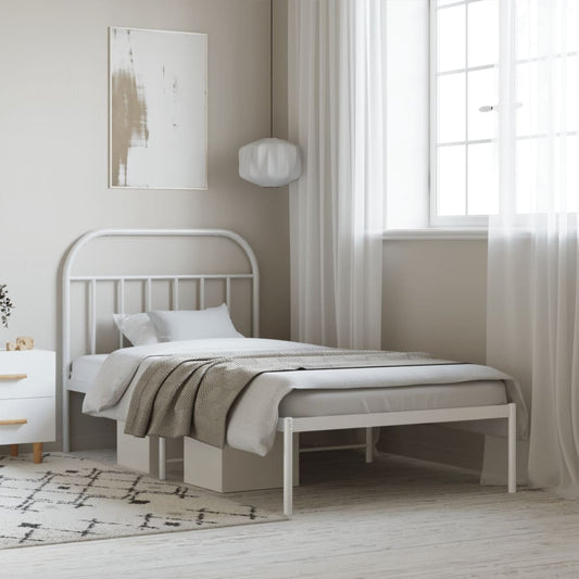 White metal twin bed frame with a curved headboard and slatted design