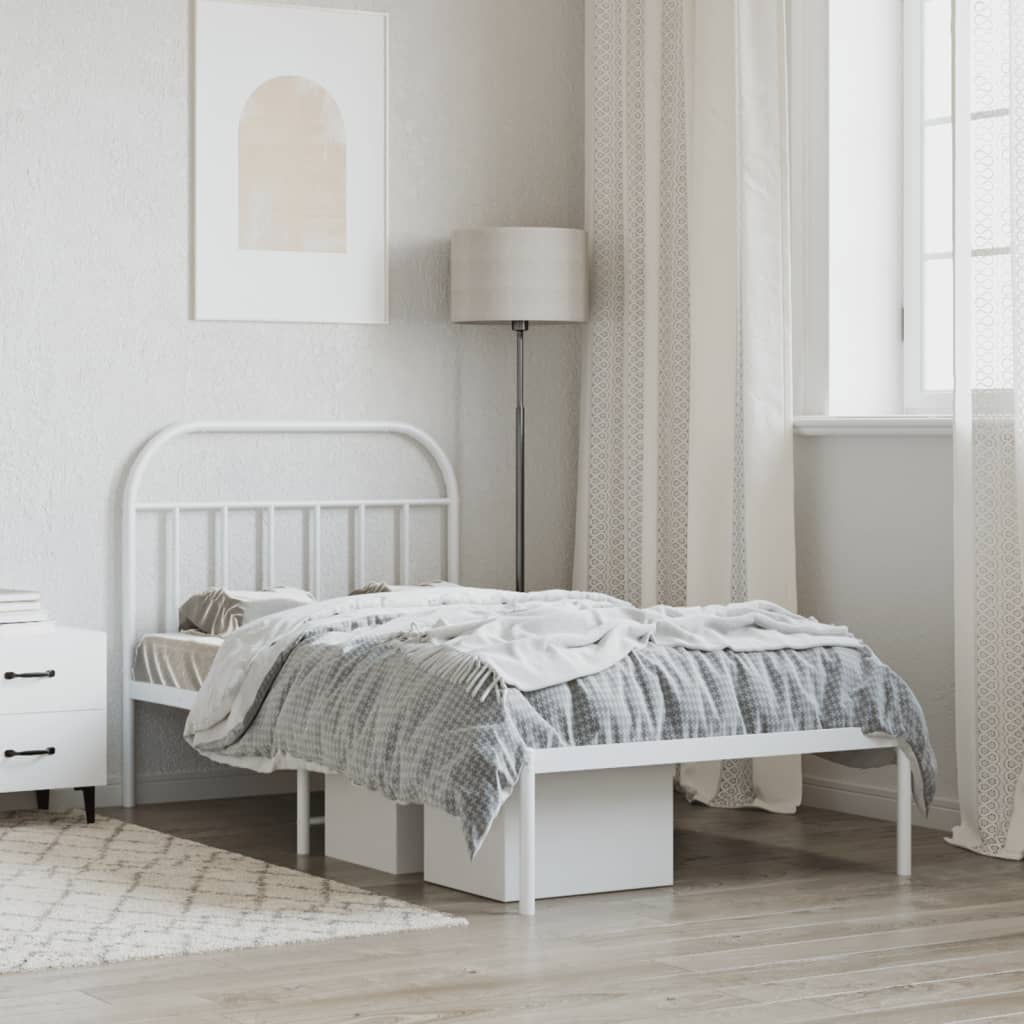 White metal twin bed frame with arched headboard