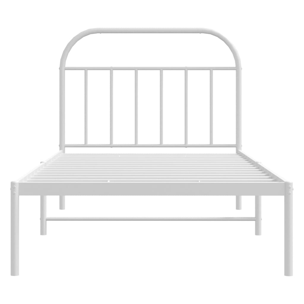 White metal twin bed frame with slatted headboard and mattress
