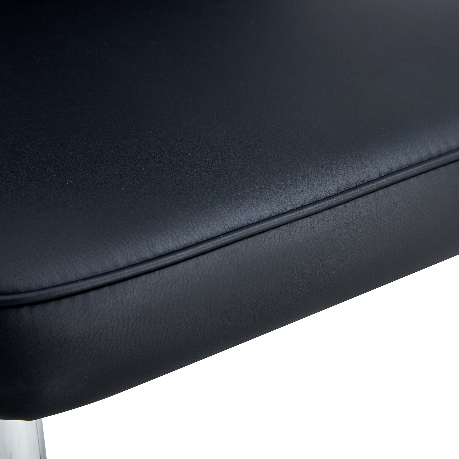 Black faux leather bar stool seat detail