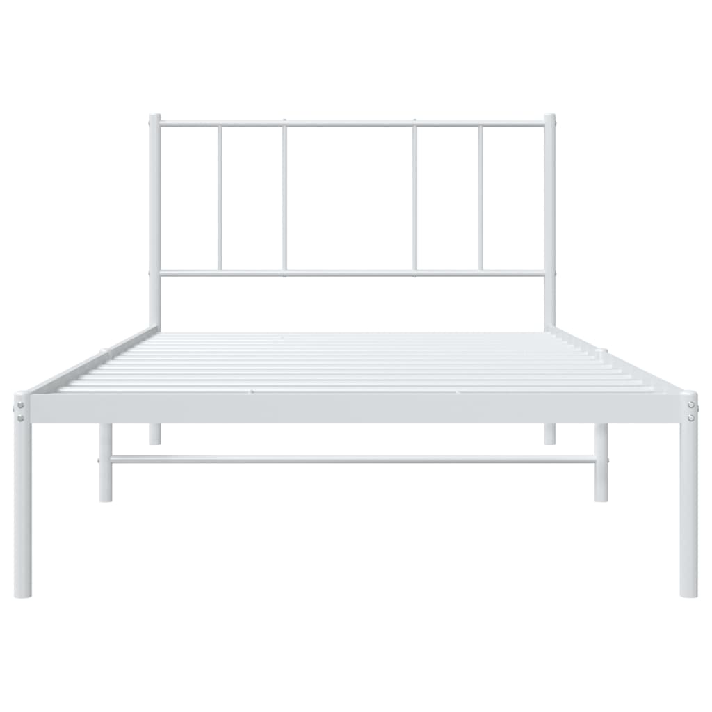 White metal bed frame with a simple headboard and a mattress
