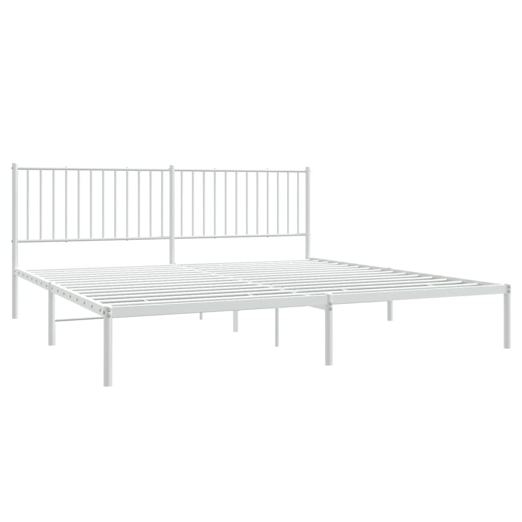White metal bed frame with a slatted headboard and mattress