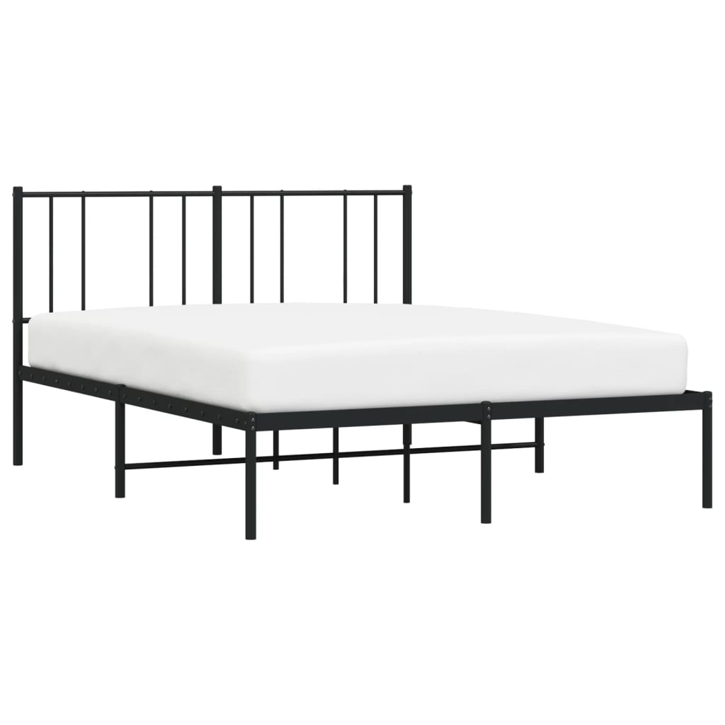 Black metal platform bed frame with a minimalist headboard