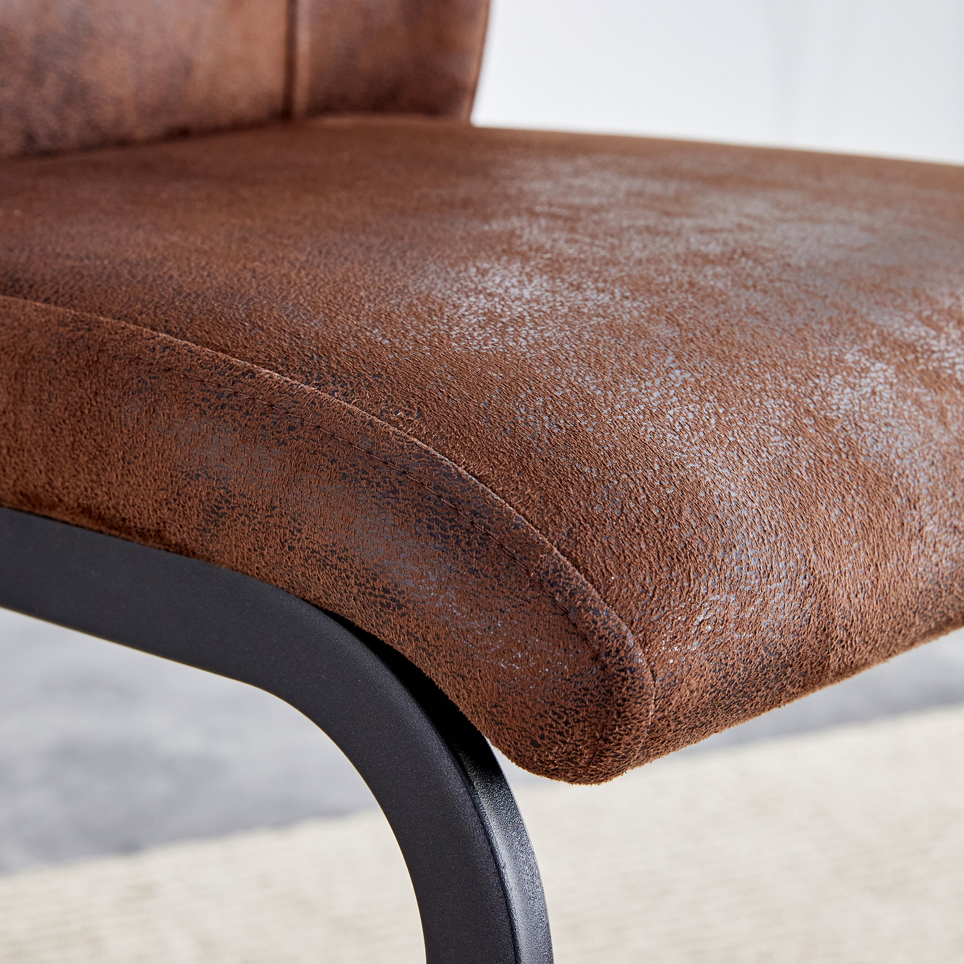 Brown suede accent chair seat with black metal frame
