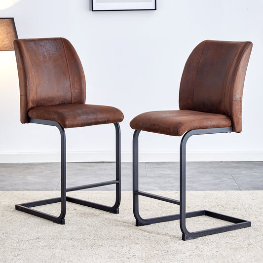 Brown faux leather cantilever bar stools with black metal frames