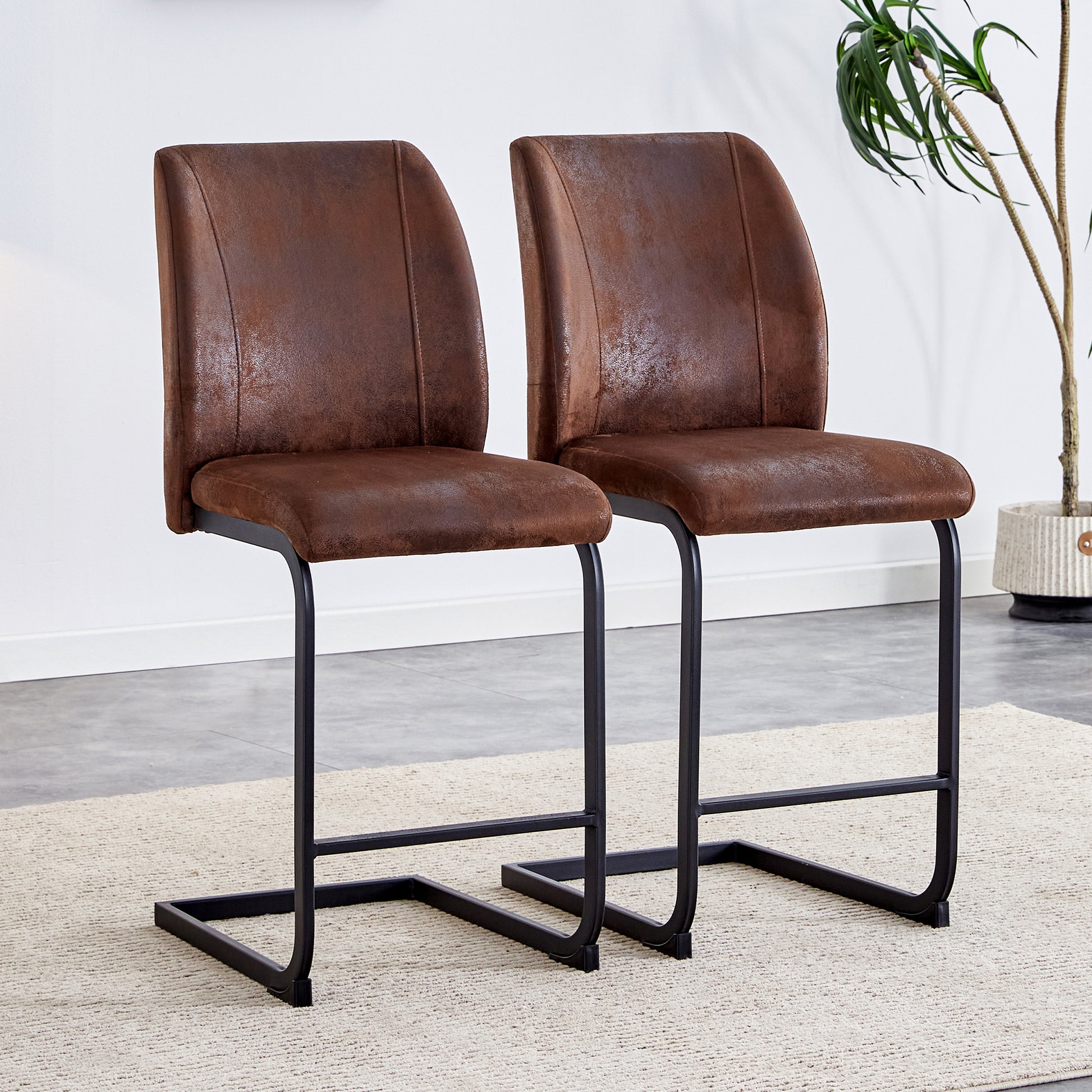 Rustic brown faux leather counter stool with black metal legs
