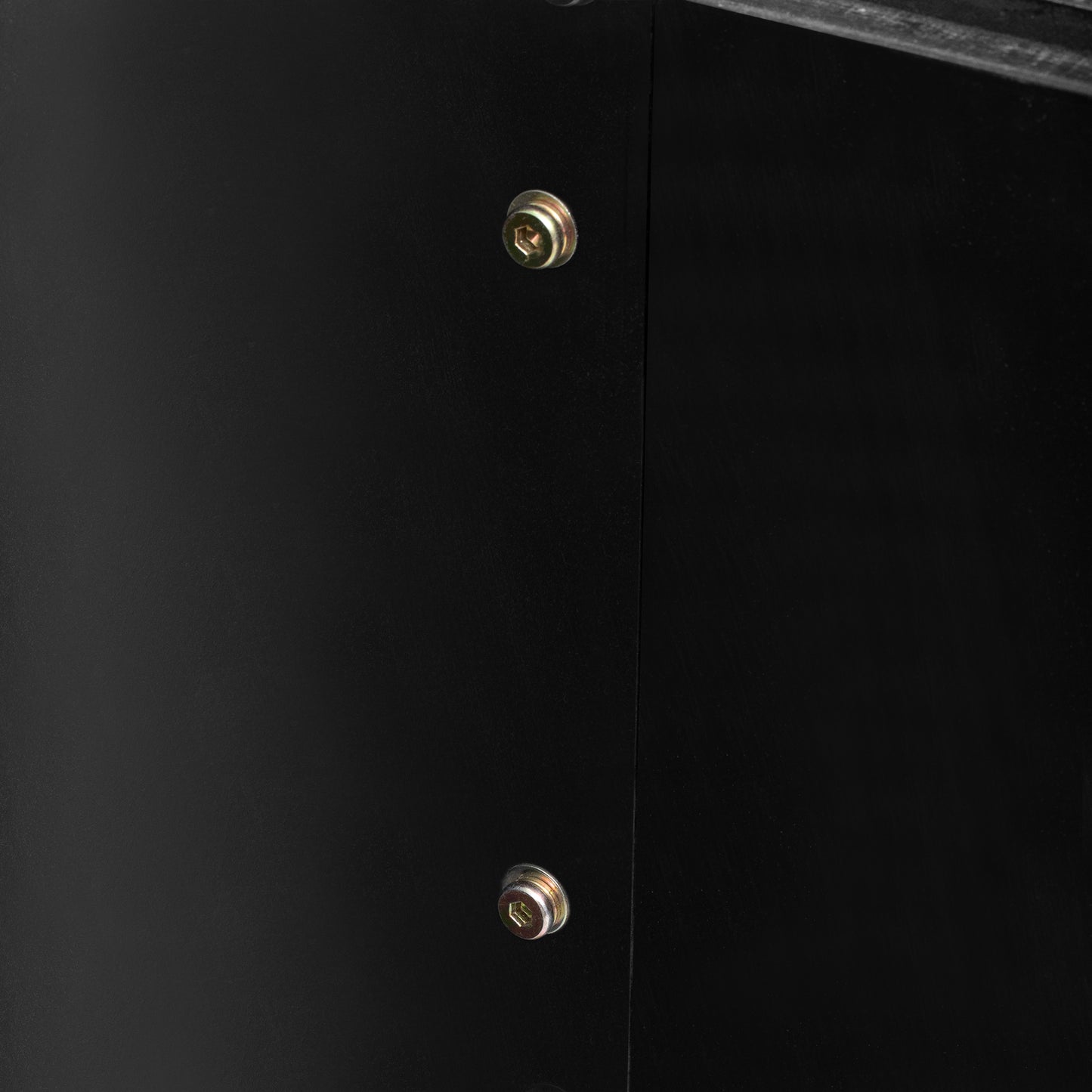Black metal cabinet detail with hexagonal screw heads