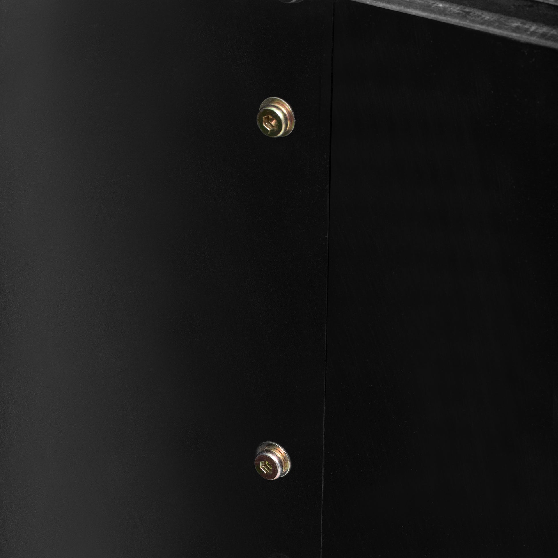Black metal cabinet detail with hexagonal screw heads