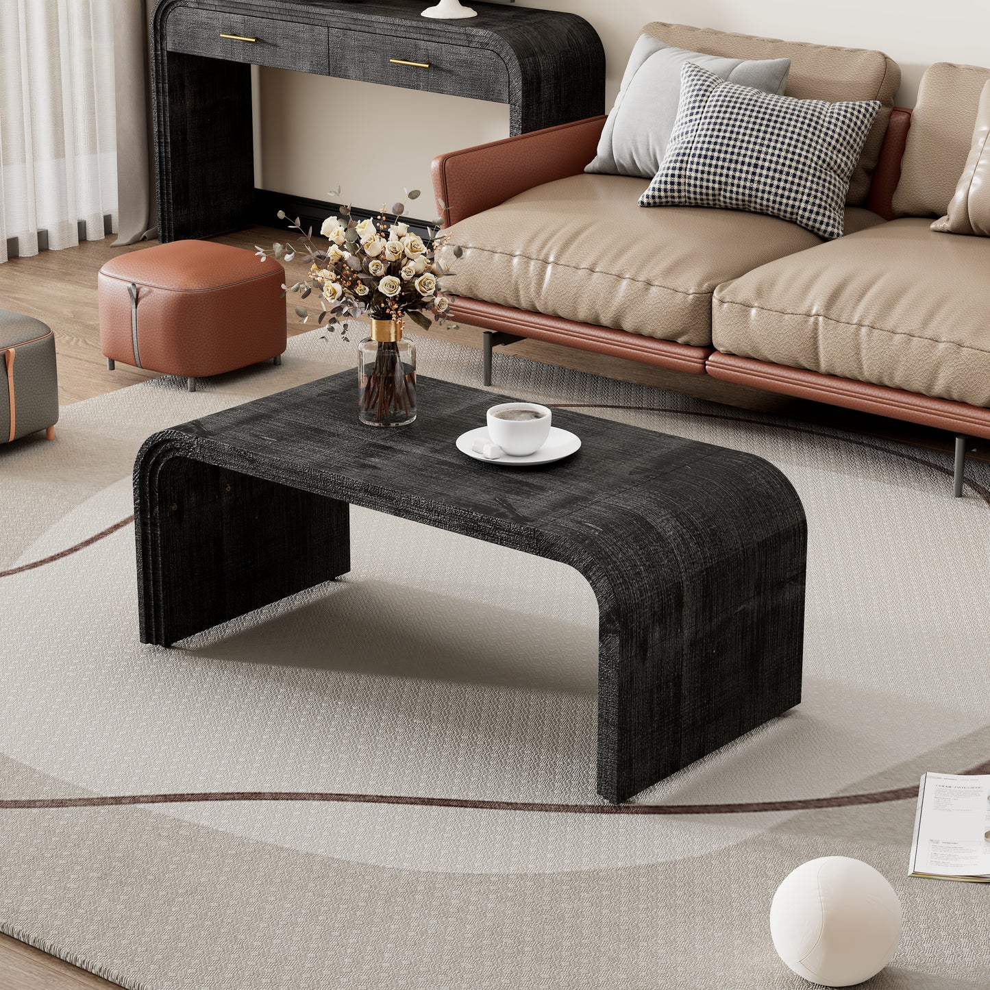 Dark wood curved coffee table with a cup of coffee