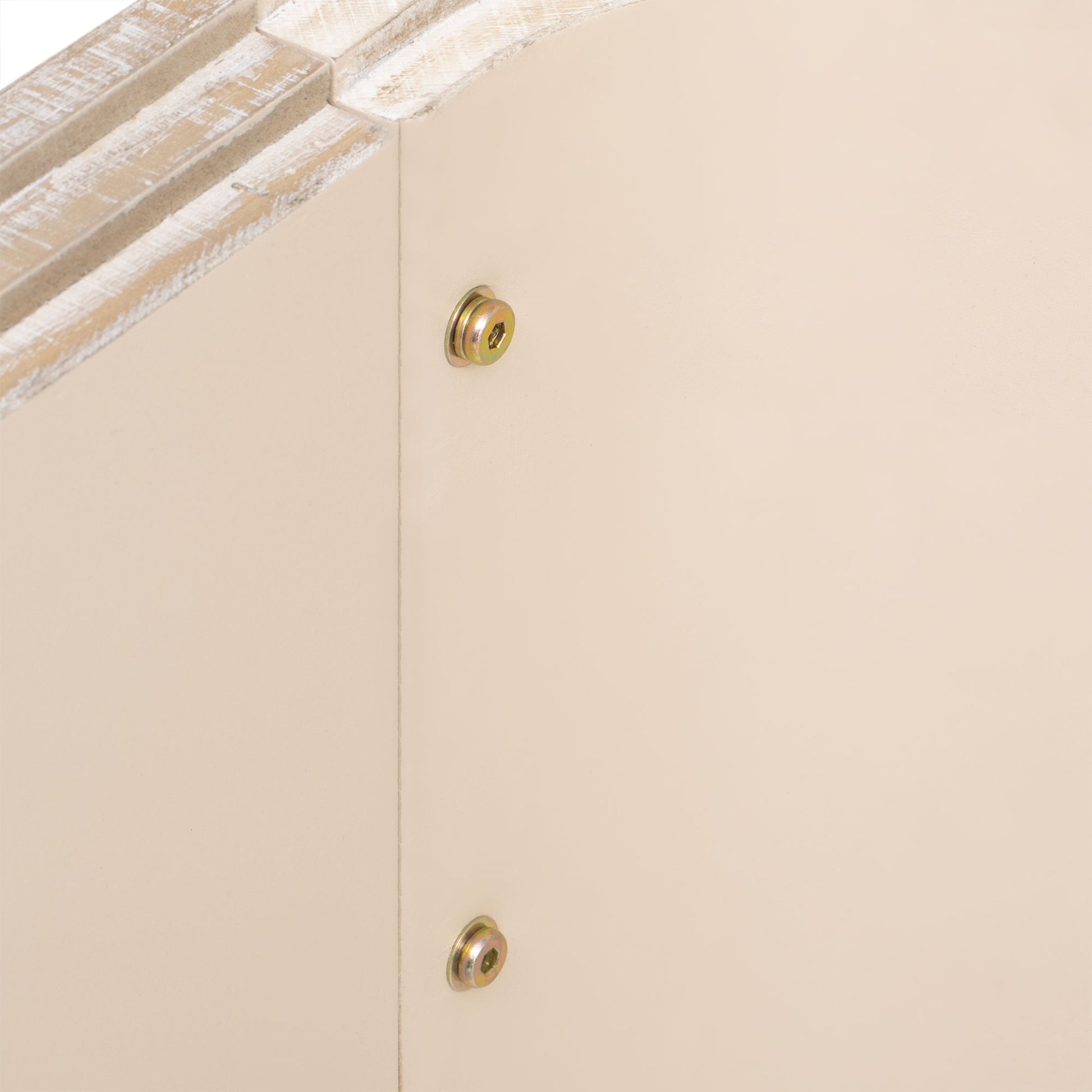 Creamcolored furniture panel with distressed wood trim and visible metal fasteners for assembly