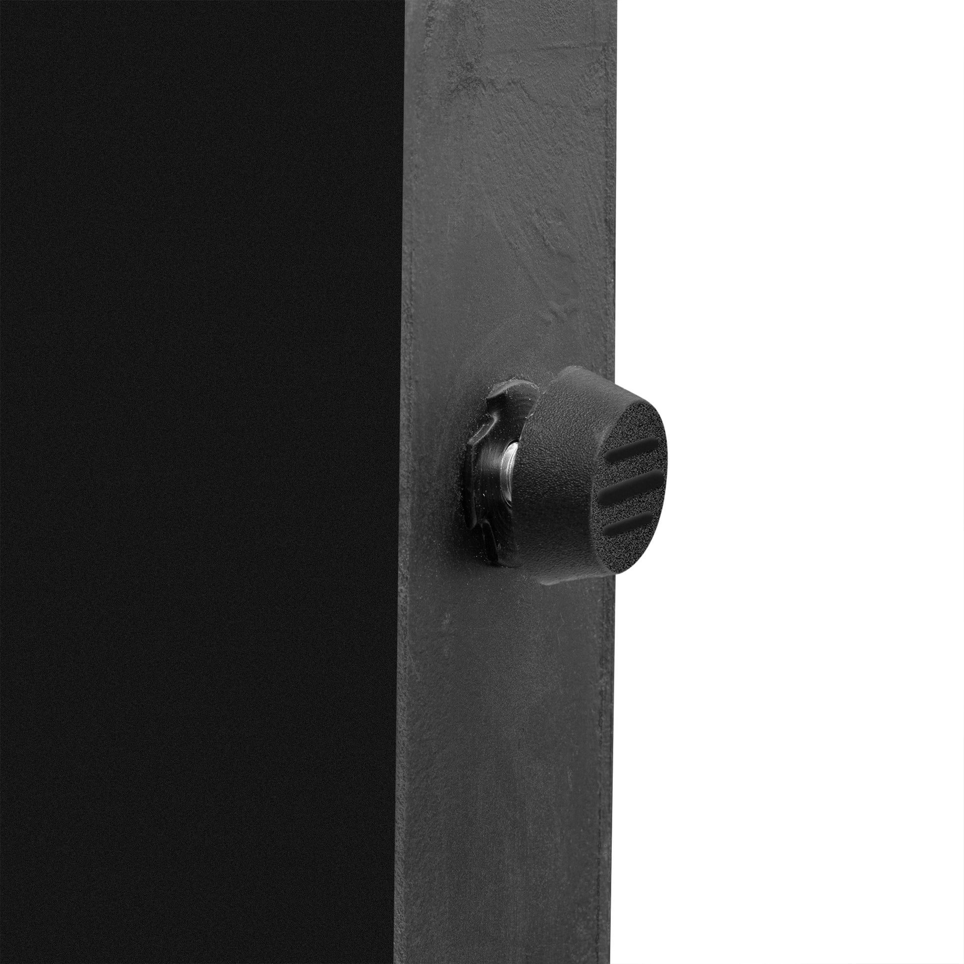 Black textured rubber foot with screw attachment on metal furniture leg