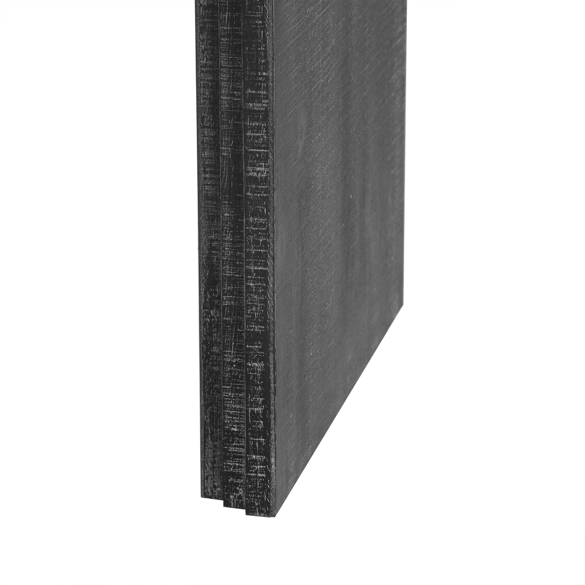 Textured black wood panel with weathered finish