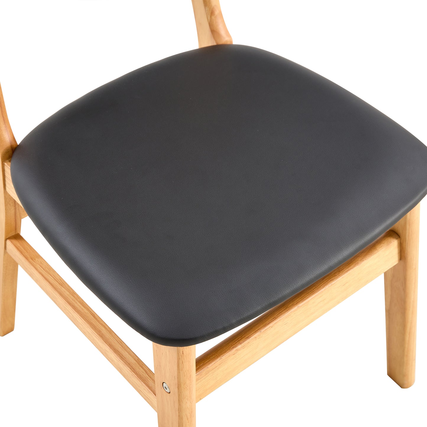 Modern wooden dining chair with a black faux leather seat