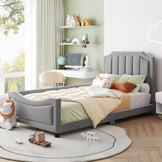 Grey velvet twin bed with tufted headboard and studded trim perfect for kids rooms